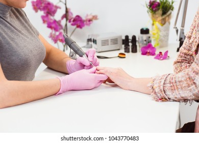 Close to the hands of the master and client during the manicure