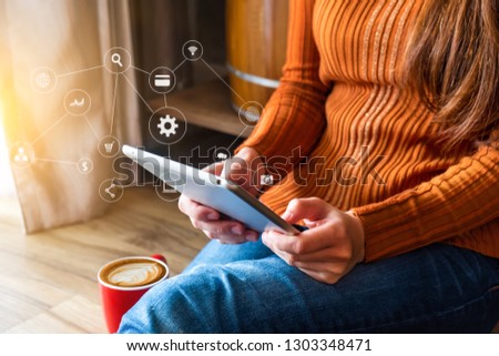 close up hands multitasking man using tablet, laptop and cellphone connecting wifi.