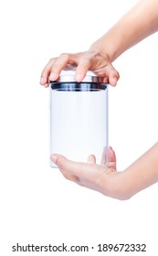 Close Up Of Hands Opening A Jar.