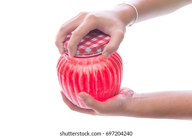 Close Up Of Hands Opening A Jar.