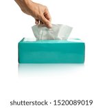 close up hands are pulling tissue in box isolated on white background