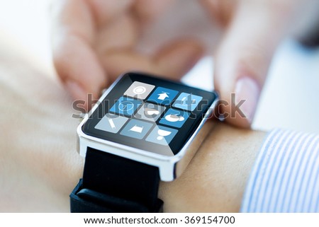 close up of hands setting smart watch application