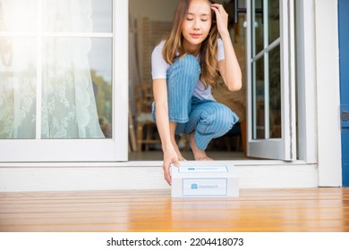 Close Up Hands Of Sick Asian Woman Sitting At Door To Receive Medication First Aid Pharmacy Box From Hospital Delivery Service At Floor Home, Female Patient Buy Drugstore Online Business, Healthcare