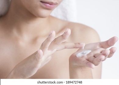 Close Up Of Hands With Skin Lotion.