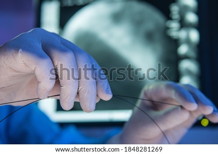 Close up of the hands with stent