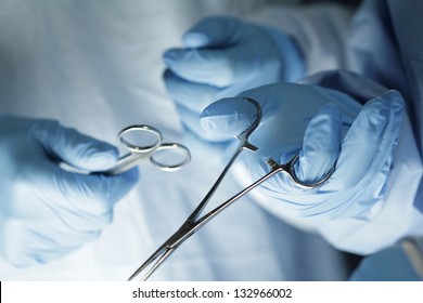 Close up of hands in surgery
