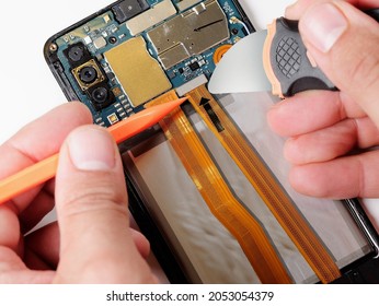 Close Up Hands Of Technician Repairing Smartphone Do It Yourself Concept Of Computer Hardware, Mobile Phone, Electronic, Repairing, Upgrade And Technology Fixing