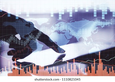 Close up of hands using device on blurry with glowing forex chart. Fund management and profit concept. Double exposure 