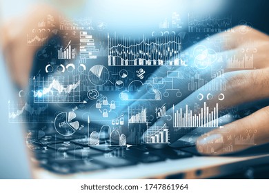 Close up of hands using laptop with creative forex hologram. Technology and trade concept. Double exposure