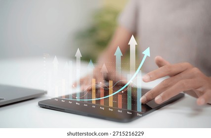 Close up hands using tablet with rising business performance chart showing data analytics growth trend financial strategy digital dashboard concept for corporate planning and success