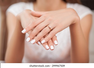 Close Up Of Hands Of Woman Showing The Ring With Diamond. She Is Engaged