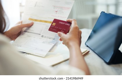 Close Up Of Hands Young Asian Woman Holding Credit And Bank Statement To Check Credit Card Expenses From Ordering Product In Internet Store, Credit Card Mock Up