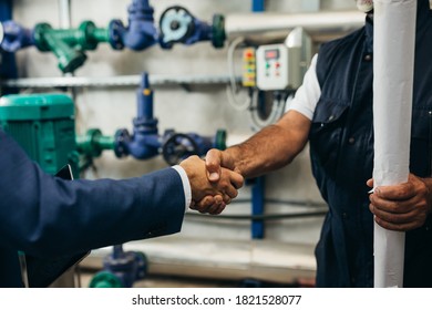 close up handshake industry workers