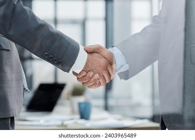 Close up of handshake in the office