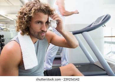 Close Up Of A Handsome Tired Young Man In The Gym