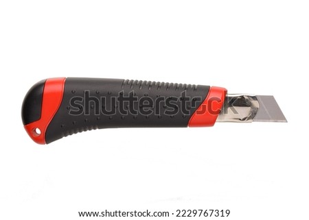 Close up of a handymans boxcutter isolated on a white Background