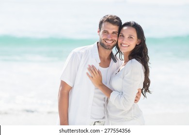 Close Up Of Happy Couple Smiling At The Beach