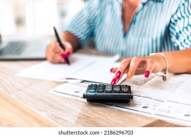 Close Up Of Happy Cute Pretty Accountant Working With Computer And Calculator.
