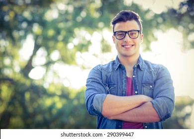 Close up of happy hipster looking at camera on a sunny day - Powered by Shutterstock