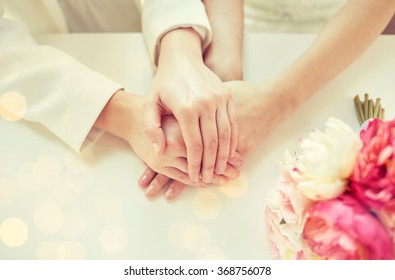 Close Up Of Happy Married Lesbian Couple Hands