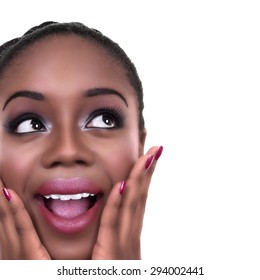 Close Up Of Happy Surprised Excited Black African American Woman In Make Up And Nail Polish Looking Sideways At Copy Space