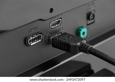 Close up of HDMI cable connected to device