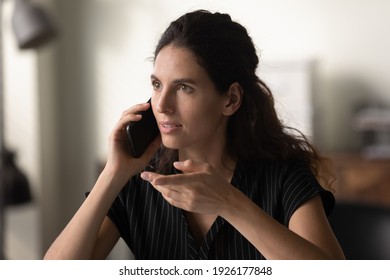 Close Up Head Shot Confident Young Woman Holding Smartphone, Talking, Making Phone Call, Businesswoman Consulting Client, Explaining, Speaking, Discussing Project With Colleague Or Business Partner