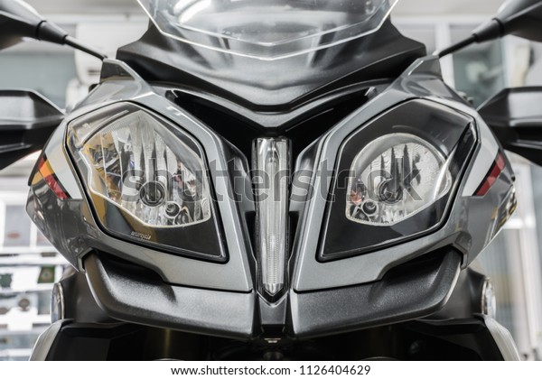 close up\
headlight or head lamp of\
motorcycle.