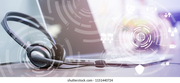 Close Up Headphone Of Call Center With Telephone Answer Machine On Table At Operation Room With Virtual Circle Wheel Business Technology Interface For Telecommunication Engineering Concept