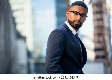 Close up headshot portrait of african american business professional, stylish modern glasses, intelligent and successful