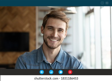 Close up headshot portrait screen view of smiling young Caucasian man look at camera have webcam conference. Happy male speak talk on video call from home, engaged in virtual digital web event.