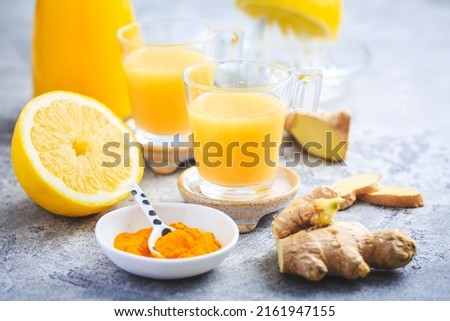 Close up of healthy Ginger Lemon Turmeric Shot ? ideal to boost the immune system