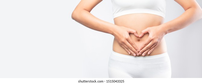 Close up healthy Stomach Ache woman hands made heart on belly isolated on white background banner size. gut health care digestion concept. 
Stomach health woman . - Shutterstock ID 1515043325