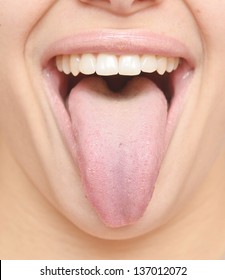 Close Up Of Healthy Woman Tongue
