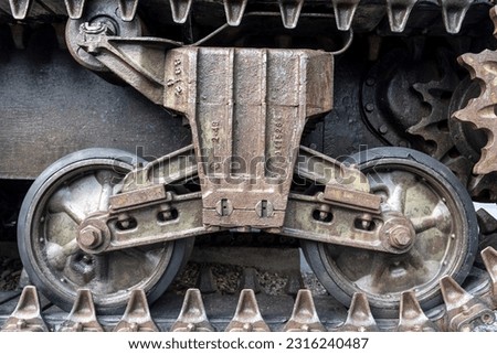 Close up of the heavy traction system of an old american tank used on the IIWW