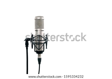 Close up of high fidelity microphone hanging  on holder isolated on white background for youtuber and vlogger.
High quality condencer microphone with clipping path.
