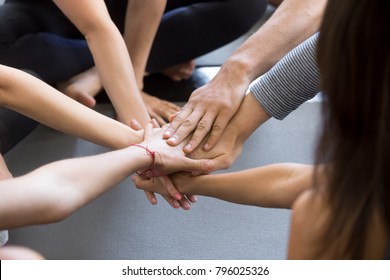 Close up of high five hand gesture, symbol of common celebration or greeting, people planning to reach their goal, slap each other to start working together. Success and teamwork concept - Powered by Shutterstock