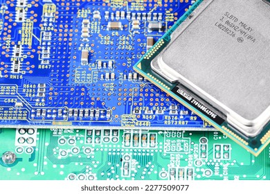 Close up of High performance CPU or central processor unit on electronic board background.