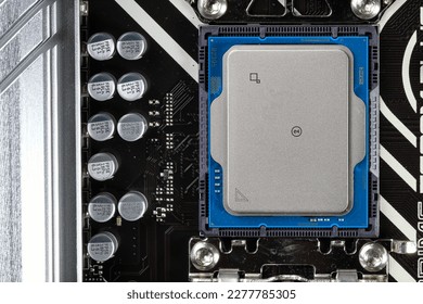 Close up of High performance CPU or central processor unit on electronic board background.
