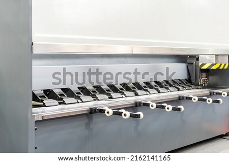 Close up High precision cnc v grooving notching and cutting machine for metal sheet or steel plate making groove or slot before bending process in industrial