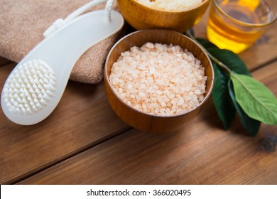 close up of himalayan pink salt with brush on wood - Powered by Shutterstock