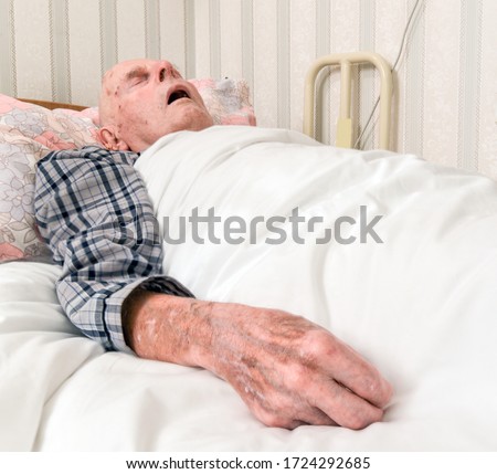 Similar – Caregiver checking blood pressure to a senior woman