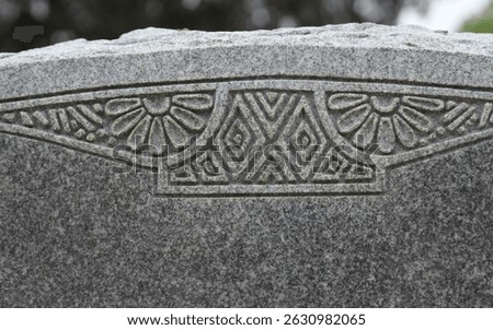 Close up of Historic Headstone With Floral Design in Rural East TX Cemetery