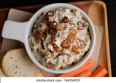 Close up Homemade    Caramelized Onion, Crab and Bacon Dip. (selective Focus)