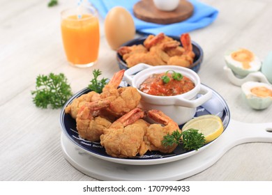 Close Up Homemade Salted Egg Prawn With Tomato Sauce At The Table  