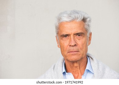 Close Up Horizontal Portrait Serious Man Against White Wall