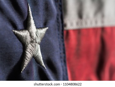 Close Up Horizontal Shot Of Texas State Flag With Blurred Stripes