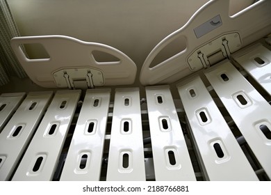 Close Up Of Hospital Bed With No Patient In Room.