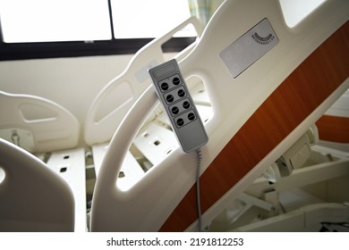 Close Up Of Hospital Bed With No Patient In Room.