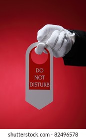  Close Up Of The Hotel Staff Holding A Door Sign Do Not Disturb